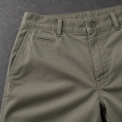 Close-up of the Grey Green cotton weave, waistband, and front pocket